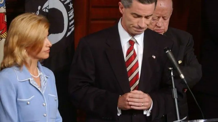 Dina Matos McGreevey, left, stands next to her husband Gov. James E. McGreevey