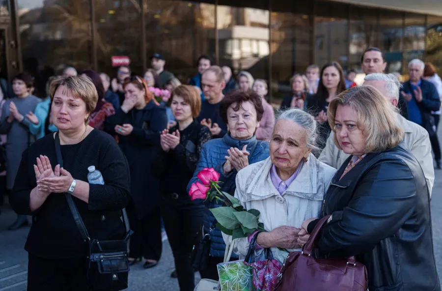 The mother of Olena Kohut, who was killed in the deadly Russian attack on Sumy, during a farewell ceremony