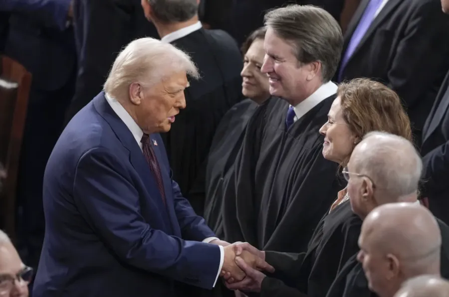 President Donald Trump, left, greets justices of the Supreme Court, from left, Elena Kagan, Brett Kavanaugh and Amy Coney Barrett, before addressing a joint session of Congress at the Capitol in Washington, March 4, 2025.